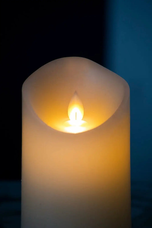 Ivory flickering LED candle with remote timer by Unique Piece Furniture on Tampa Home & Garden Store