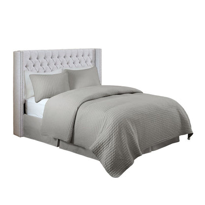 Queen upholstered headboard with tufted buttons and nailhead trim in gray fabric on Tampa Home & Garden Store