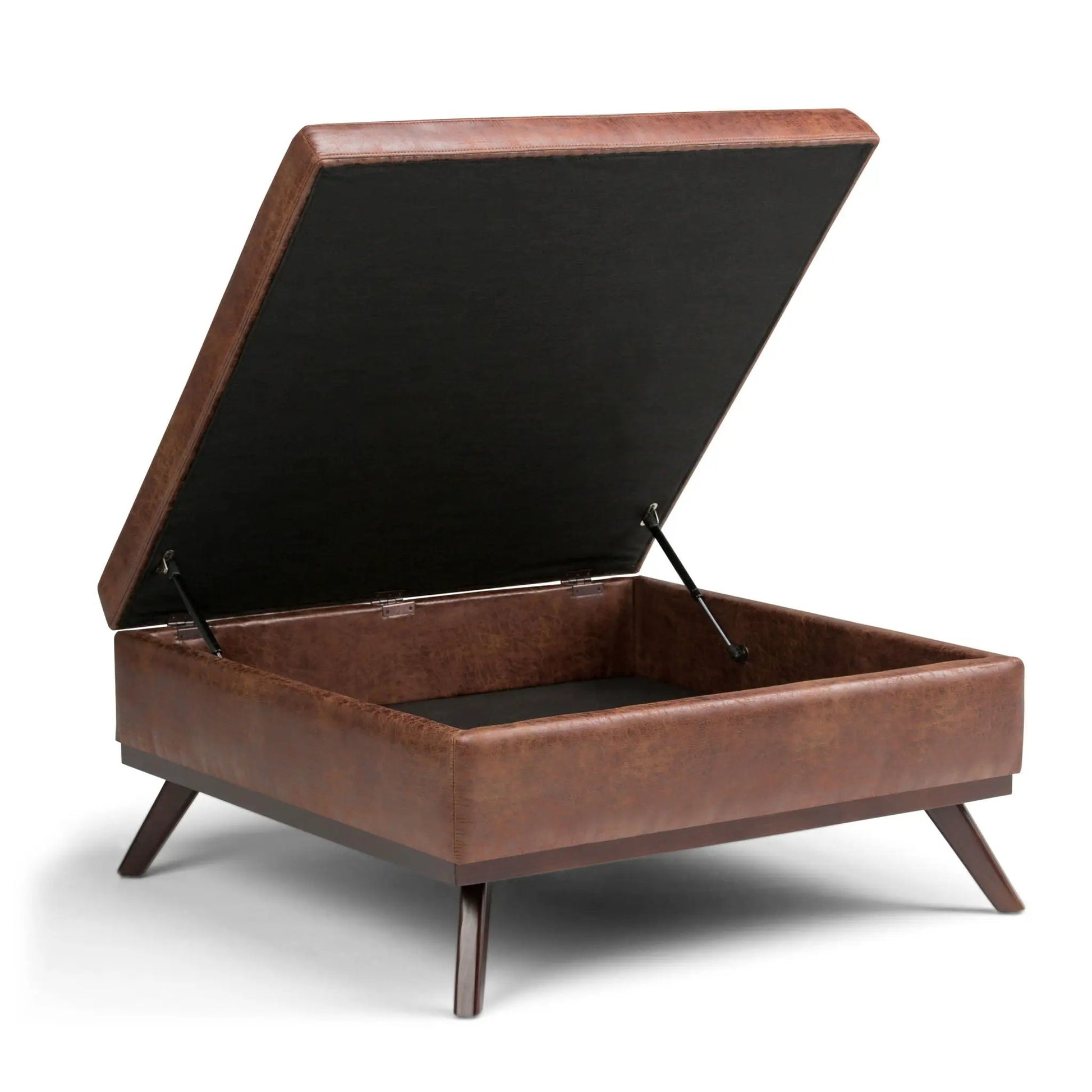 Owen storage ottoman in brown faux leather with black interior and lift-top lid on Tampa Home & Garden Store