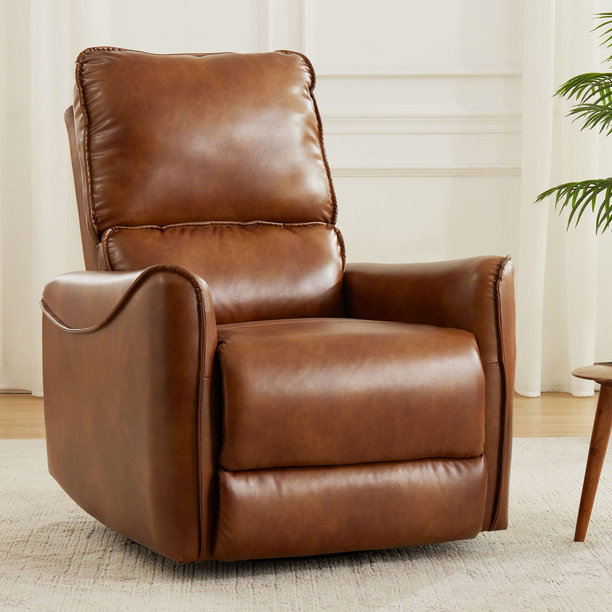 Electric recliner chair brown leather with rocker and swivel function, padded headrest and arms on Tampa Home & Garden Store