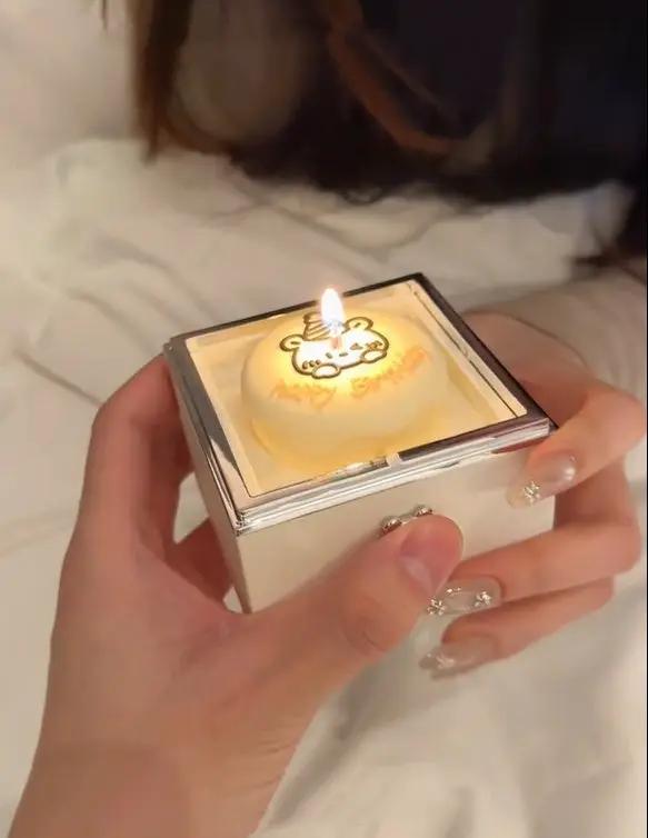 Valentine's Day girlfriend bear cake flip ring box with yellow cake and lit candle held in hands on Tampa Home & Garden Store