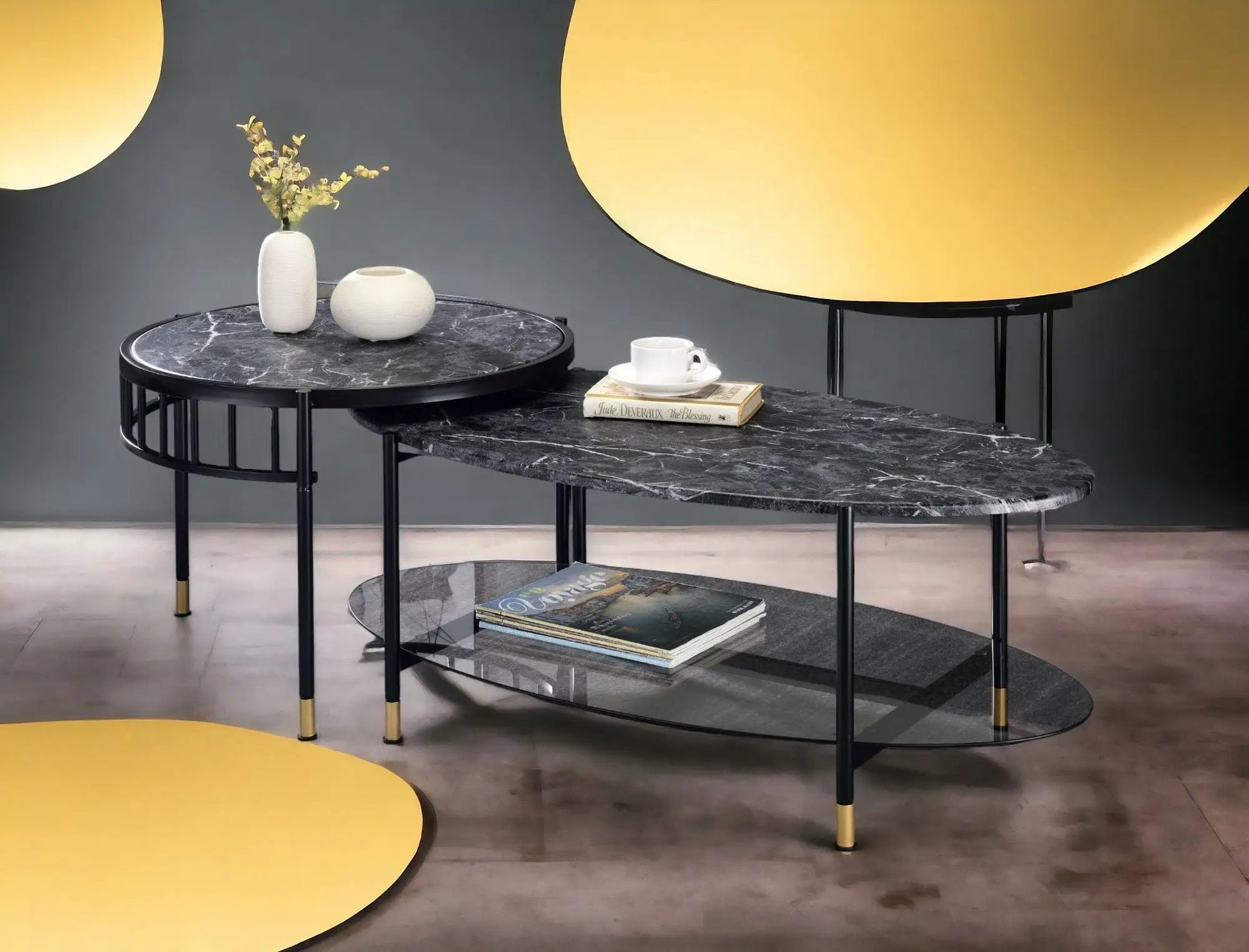Silas nesting tables with black engineered stone tops, two round tabletops on slim black legs on Tampa Home & Garden Store