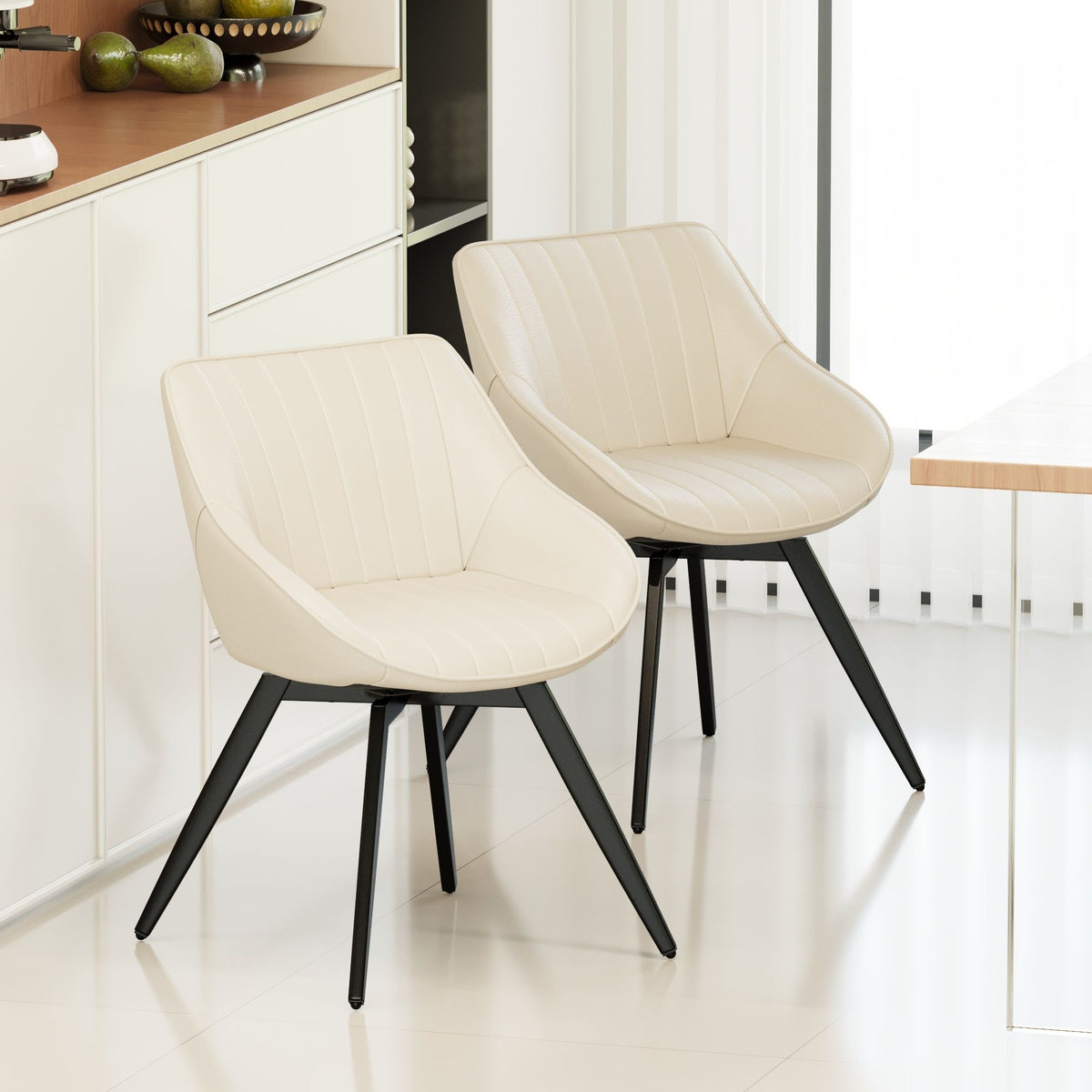 Modern Medieval Kitchen Dining Chairs with 360° rotation, cream faux leather, black metal legs on Tampa Home & Garden Store