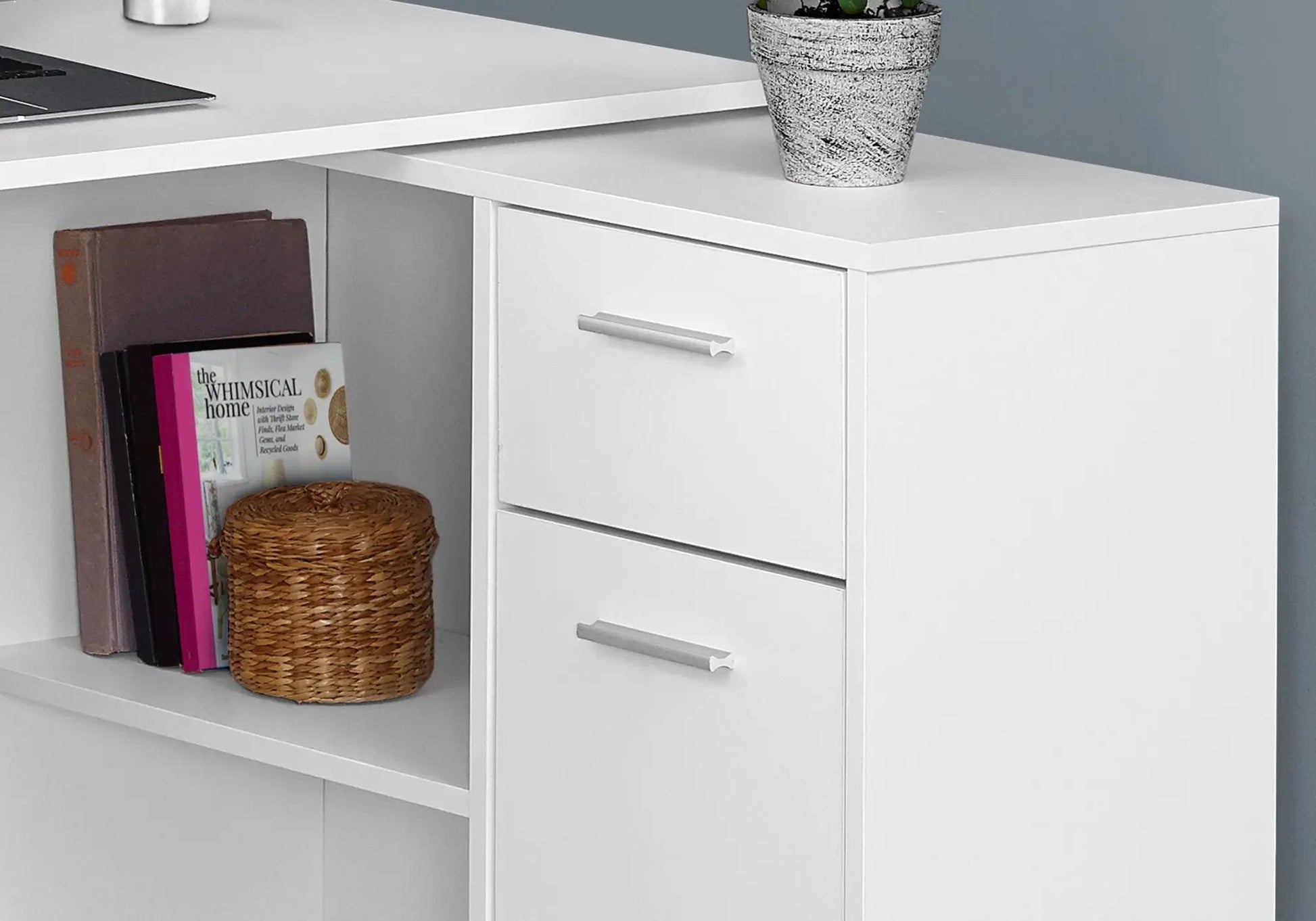 White L-shaped corner computer desk with three drawers and open shelf, modern home office setup on Tampa Home & Garden Store