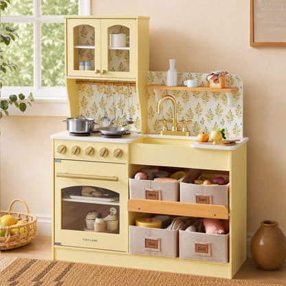 Tiny Land wooden play kitchen in yellow with glass-front cabinet and floral backsplash and sink on Tampa Home & Garden Store