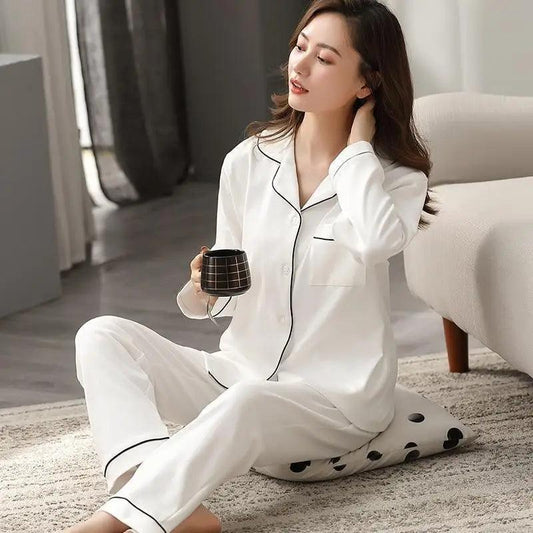 White cotton pajama set with black piping, button-down top and wide-leg pants by Stevvex on Tampa Home & Garden Store