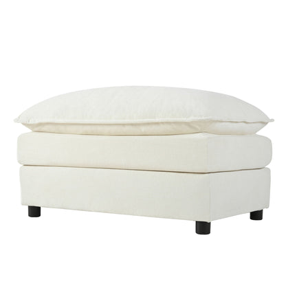 Cream fabric ottoman with two plush cushions and black legs on Tampa Home & Garden Store