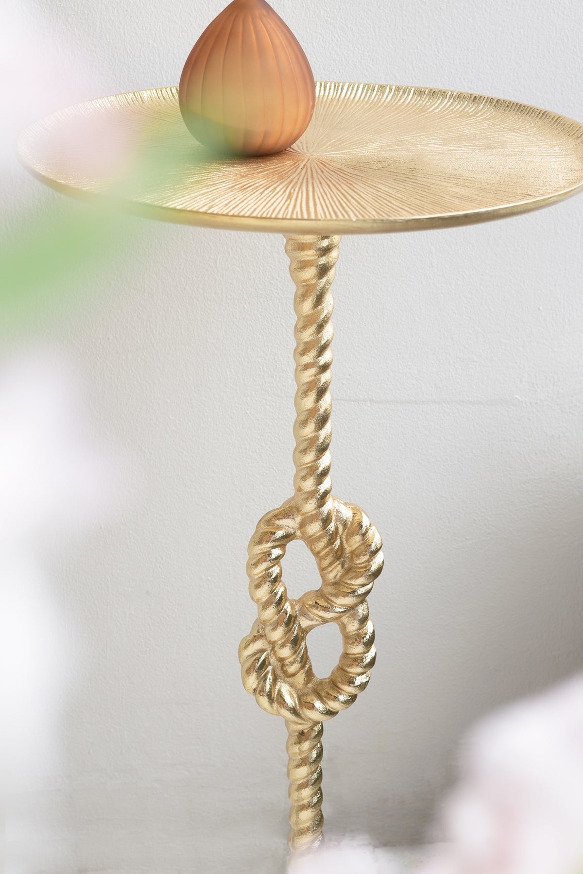 Gold end table with rope-twist pedestal and textured round top, decorative orb accent on Tampa Home & Garden Store