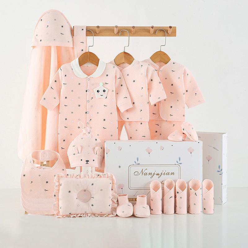 Pink newborn baby clothes gift set with hat, bib, booties and blanket in a gift box on Tampa Home & Garden Store