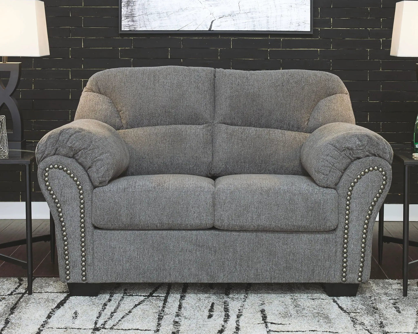Allmaxx living room loveseat in gray fabric with rolled arms and nailhead trim on Tampa Home & Garden Store