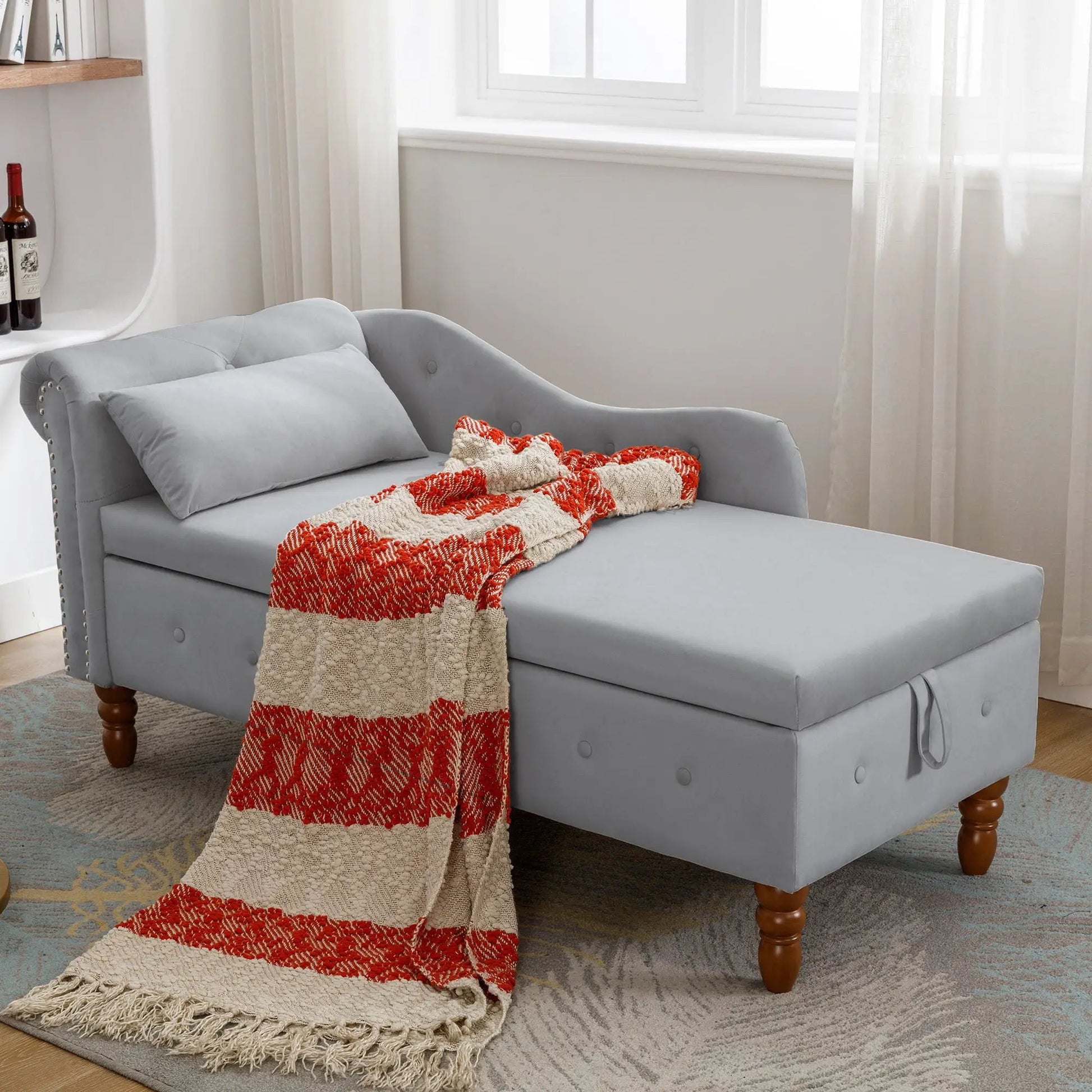 Unique Piece Furniture gray upholstered chaise lounge with nailhead trim and pillow on Tampa Home & Garden Store