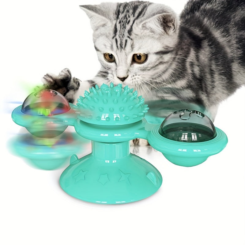 Sell My Stuff teal windmill cat toy with rotating spiky center ball and suction cup bases on Tampa Home & Garden Store