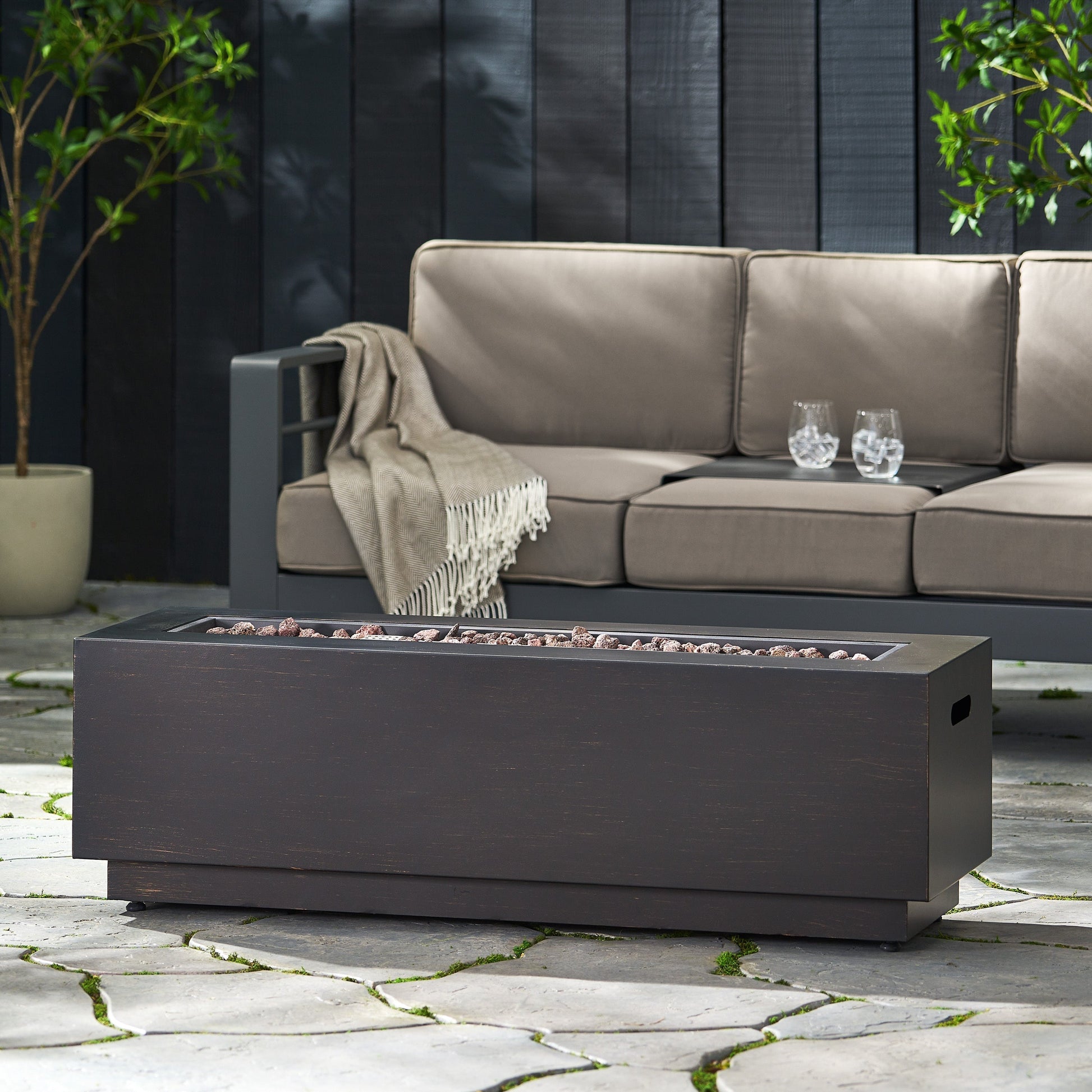 Modern dark grey outdoor iron propane fire pit HouseOfZazla with lava rocks on Tampa Home & Garden Store