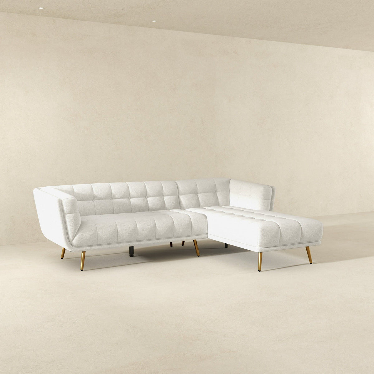 HouseOfZazla L-shaped tufted sofa, white upholstery, mid-century design, gold legs on Tampa Home & Garden Store