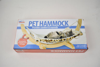 Solid wood hammock bed by Sell My Stuff with leopard print reversible cover on wooden frame on Tampa Home & Garden Store