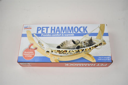 Solid wood hammock bed by Sell My Stuff with leopard print reversible cover on wooden frame on Tampa Home & Garden Store