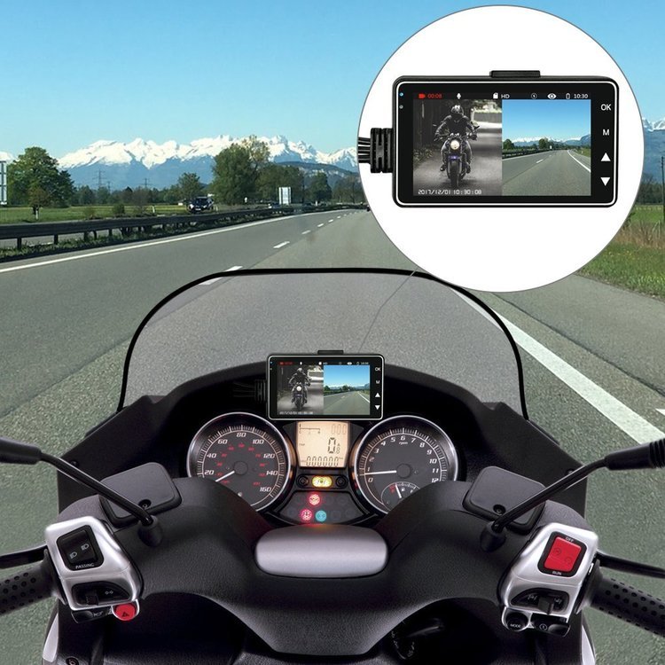 Motorcycle dash cam mounted on handlebars with bright display showing road footage on a highway on Tampa Home & Garden Store