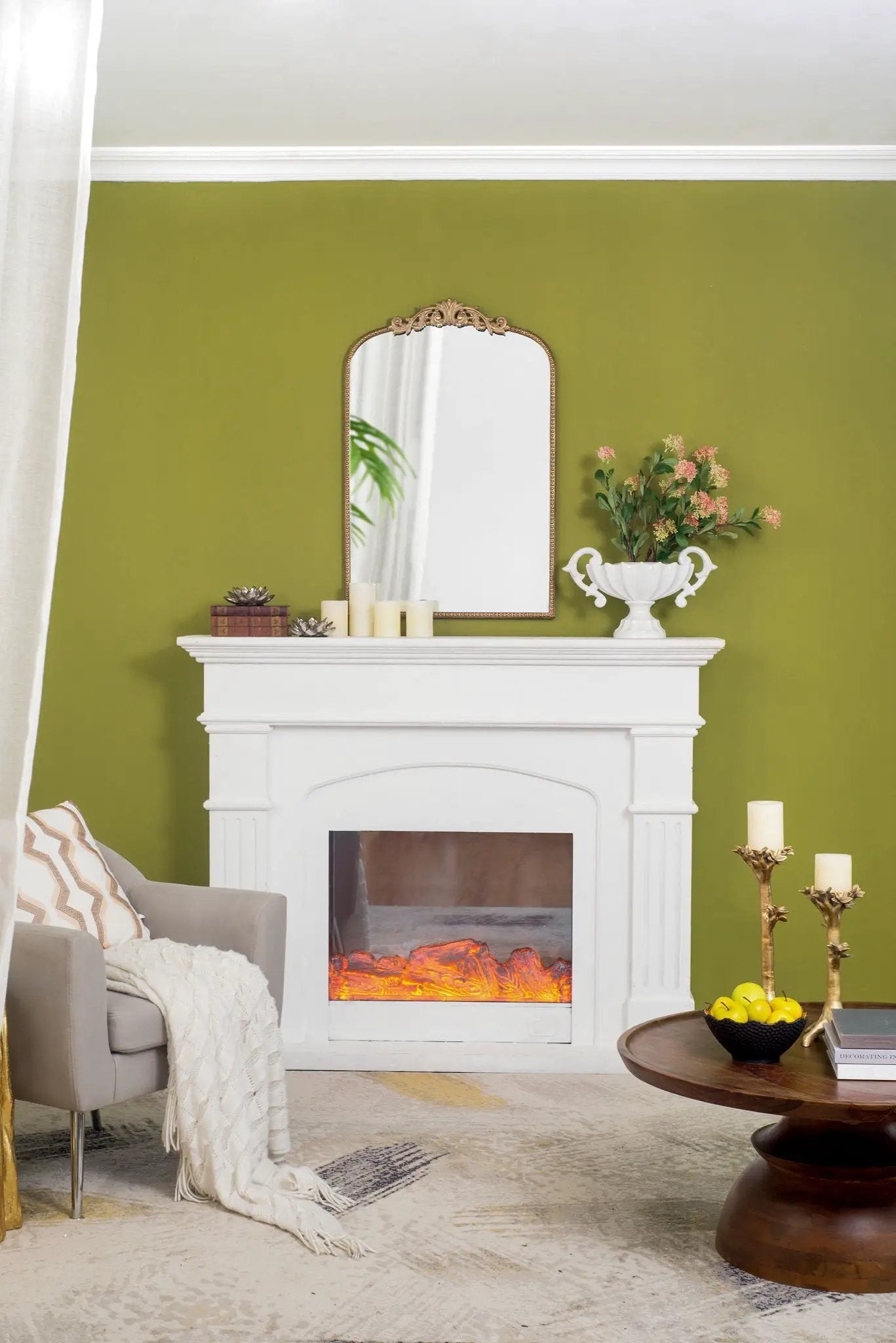 Arch Mirror with ornate gold frame by Unique Piece Furniture on olive wall above mantel on Tampa Home & Garden Store