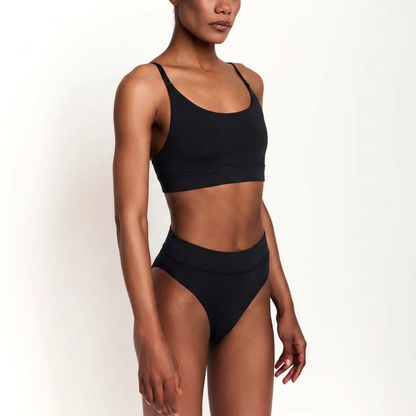 Scoop bralette and matching black organic cotton briefs two-piece set on model on Tampa Home & Garden Store