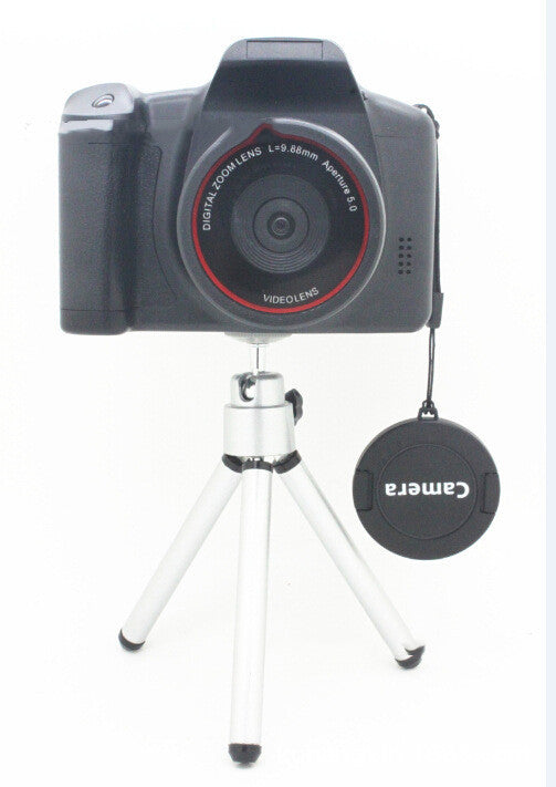 XJ05 Digital Video Camera, black body on a small silver tripod with a red-ring lens on Tampa Home & Garden Store