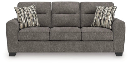 Olten sofa in gray textured fabric, three-seat with two striped decorative pillows on Tampa Home & Garden Store