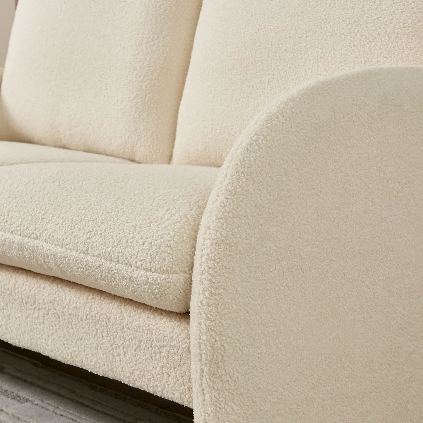 Loveseat sofa beige Sherpa fabric upholstery closeup highlighting plush textured cushions on Tampa Home & Garden Store