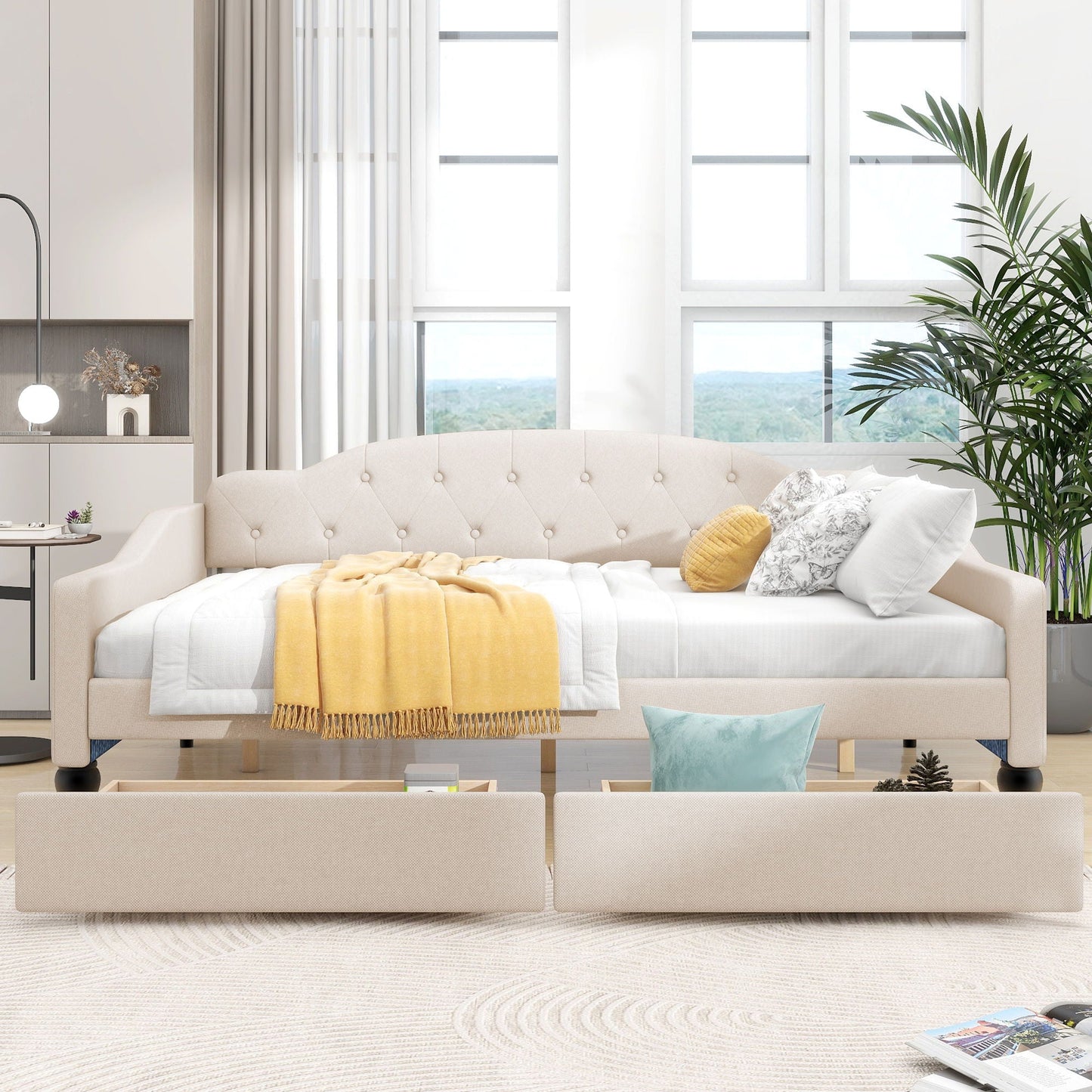 Upholstered beige tufted daybed with buttoned back, cushions, and a mustard throw on Tampa Home & Garden Store
