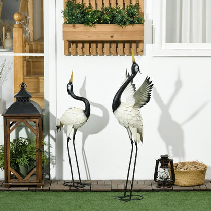 Outsunny Heron Garden Statues Set of 2 metal cranes with black legs and white bodies on Tampa Home & Garden Store