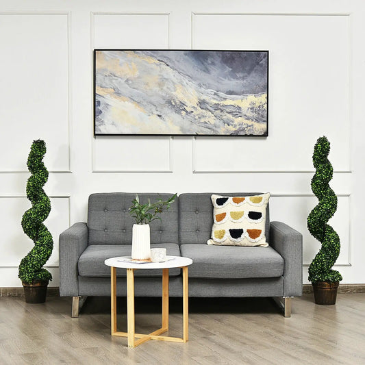 2 Pack Artificial Spiral Boxwood Topiary Trees green in pots flanking a gray sofa on Tampa Home & Garden Store