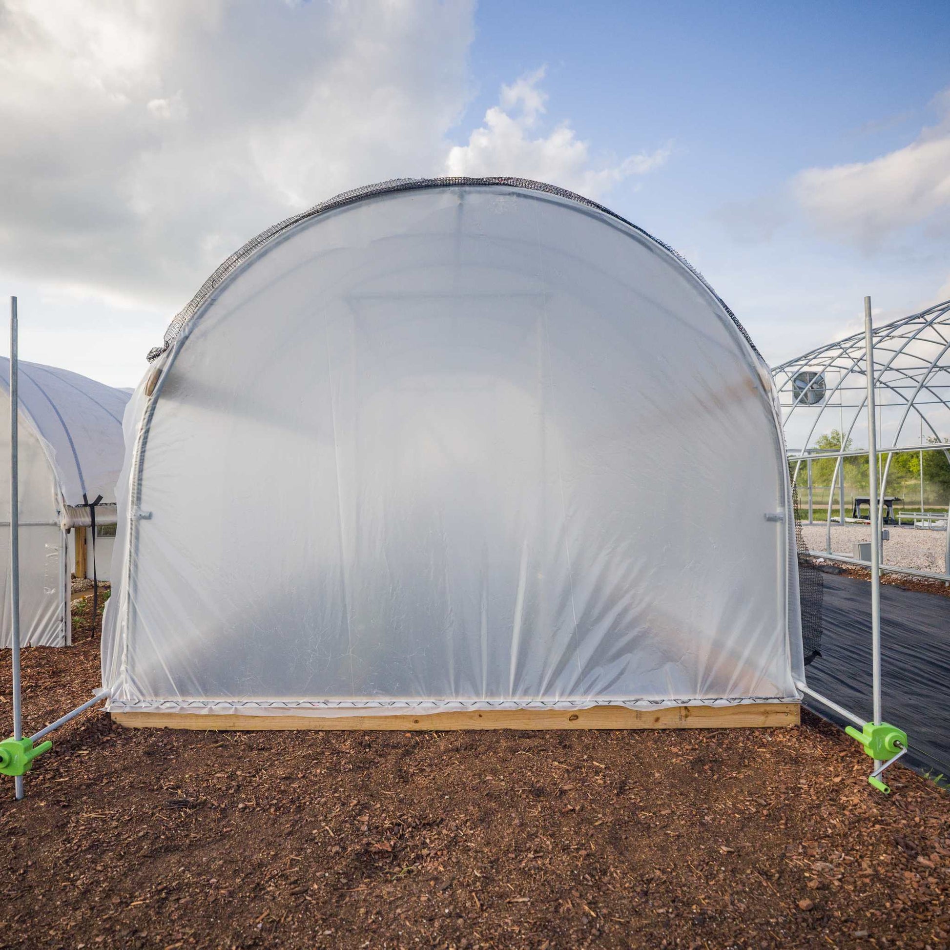Bootstrap Farmer 10' Essential High Tunnel Kit greenhouse with roll-up sides and end wall door on Tampa Home & Garden Store