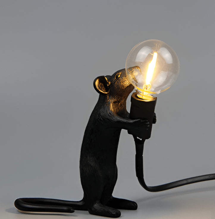 Mouse table lamp by Stevvex, black resin rat figure holding a clear LED bulb for desk decor on Tampa Home & Garden Store