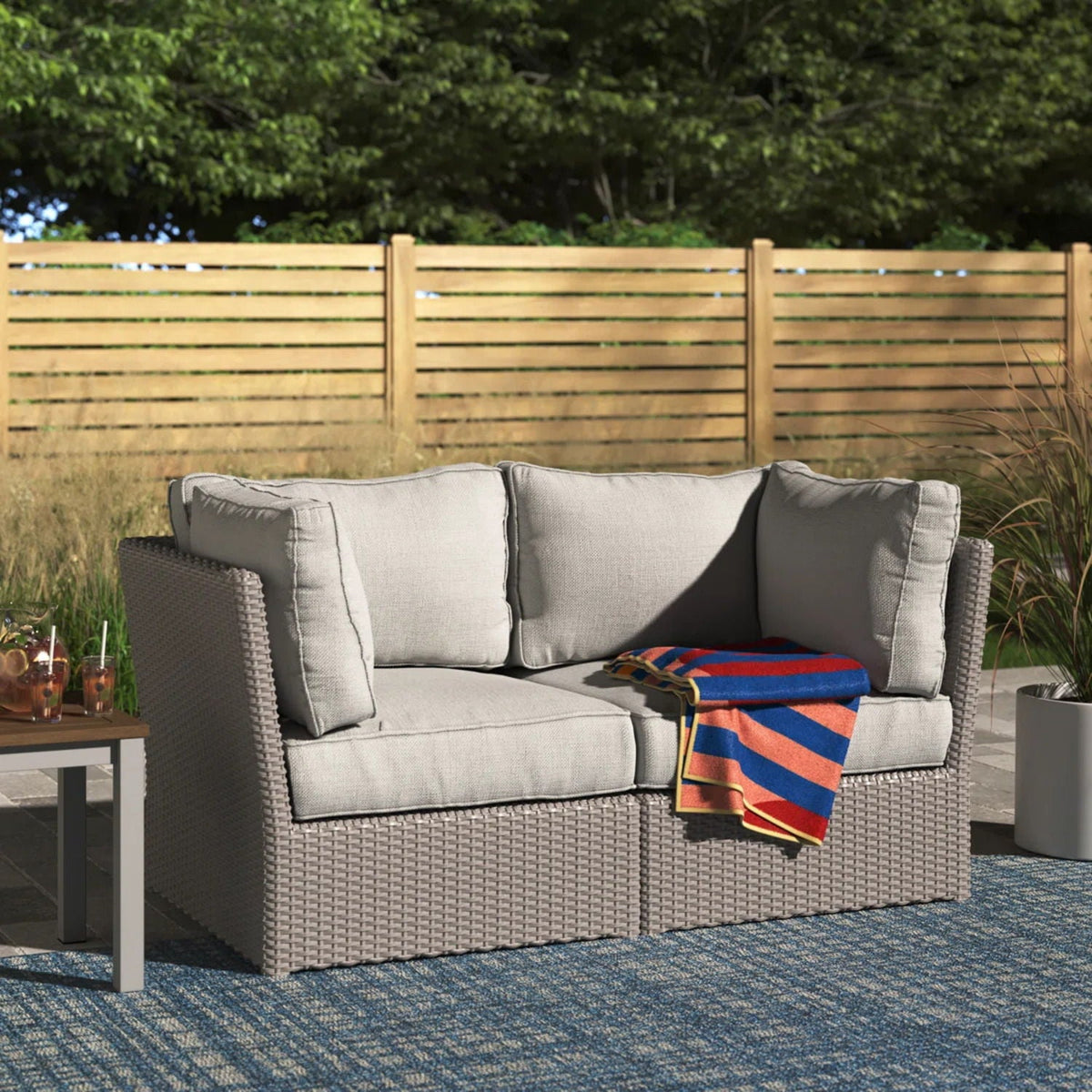 Modern patio wicker loveseat with light gray cushions HouseOfZazla on Tampa Home & Garden Store