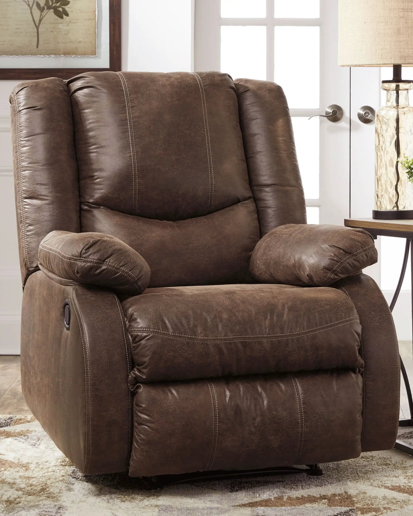 Bladewood Recliner in brown leather with contrast stitching and plush cushions on Tampa Home & Garden Store
