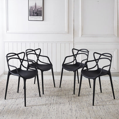 Dining chair set of 4 black plastic seats with curved wire-frame backs on Tampa Home & Garden Store