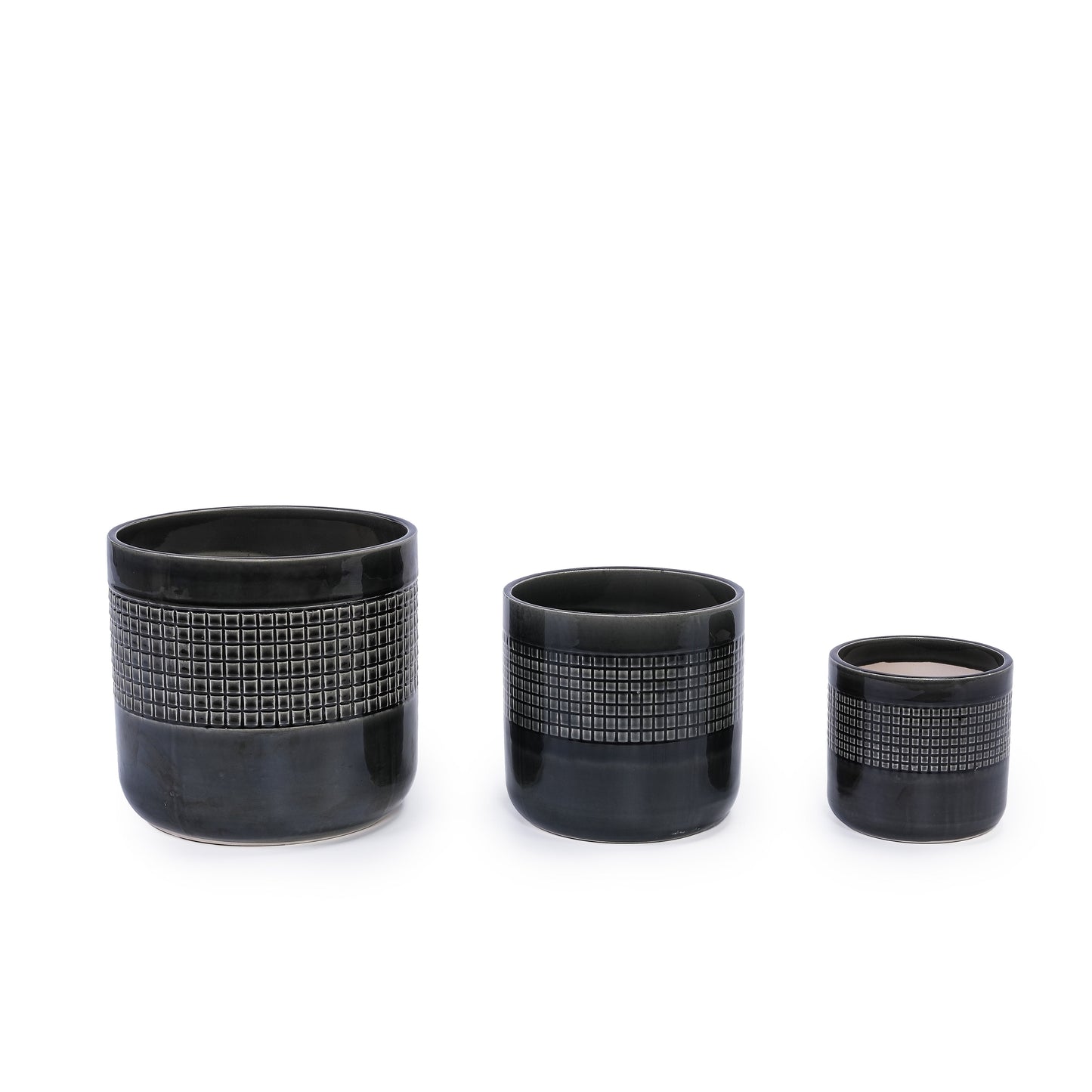 Handmade garden pots in black ceramic with grid-textured midsection and varying heights on Tampa Home & Garden Store