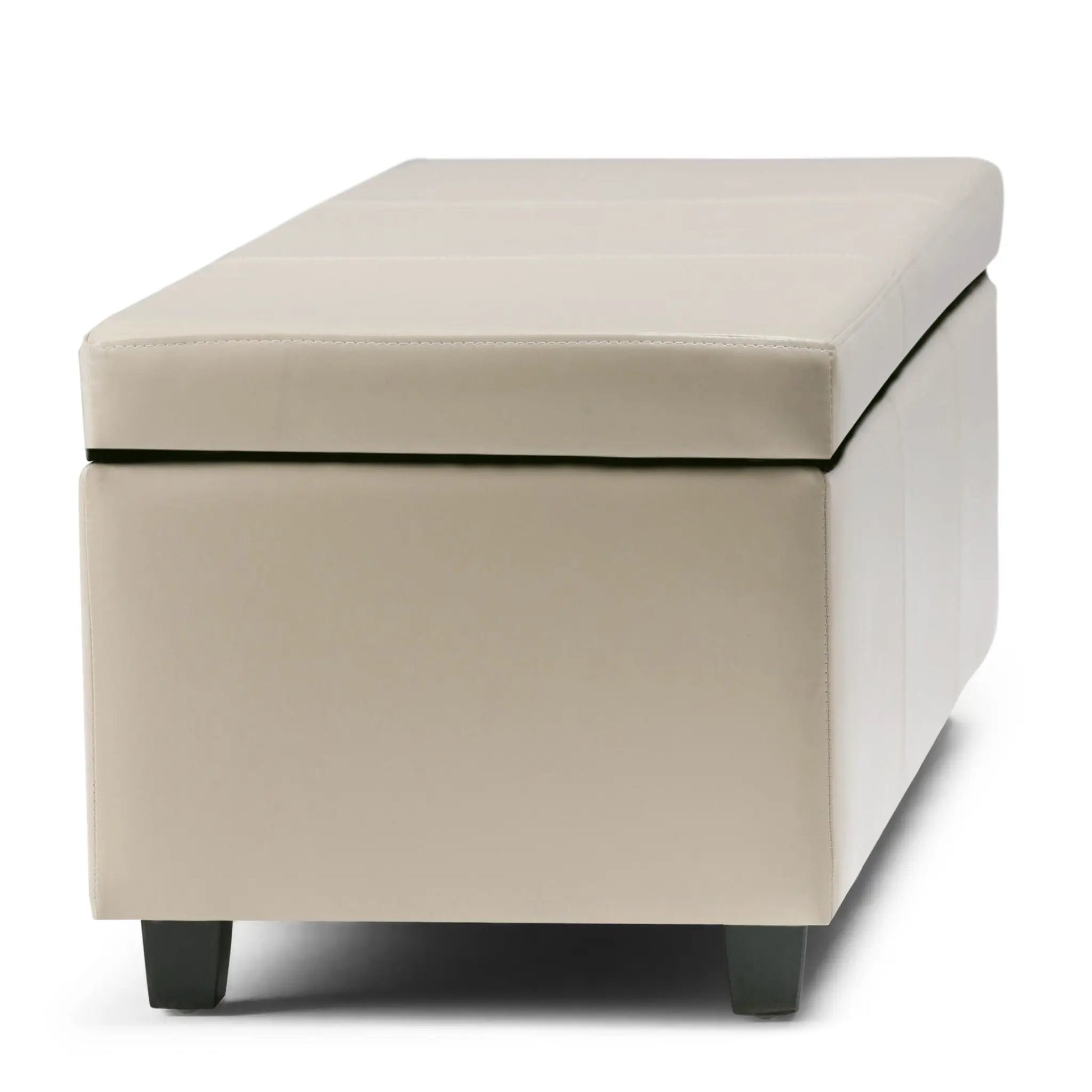 Avalon storage ottoman bench in beige leather with dark tapered legs on Tampa Home & Garden Store
