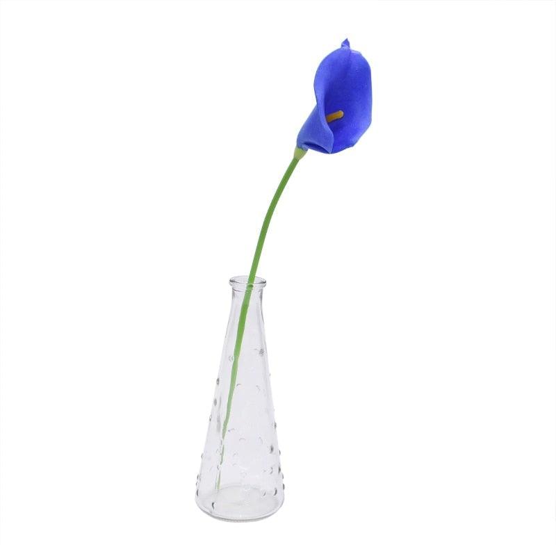 Calla lily artificial flower in blue with green stem in a clear dotted glass vase on Tampa Home & Garden Store