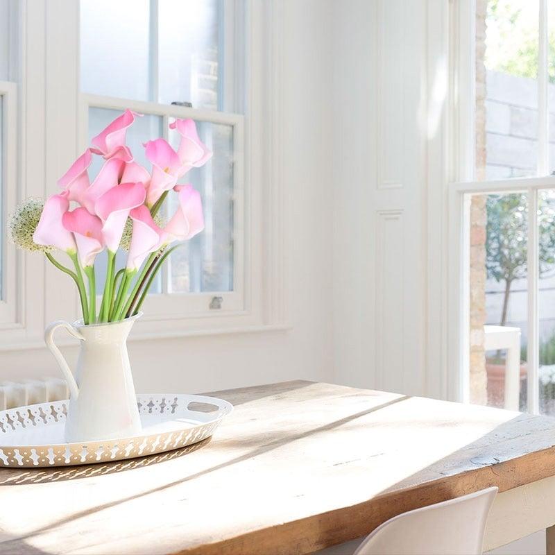 Calla Lily artificial bouquet 10Pcs real-touch pink flowers in white pitcher on a light wood tray on Tampa Home & Garden Store