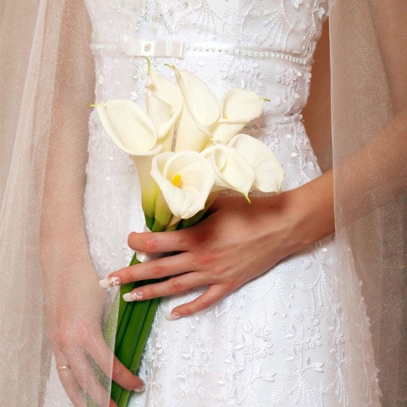 Calla lily artificial bouquet 10 pcs white Stevvex held by bride in wedding dress on Tampa Home & Garden Store