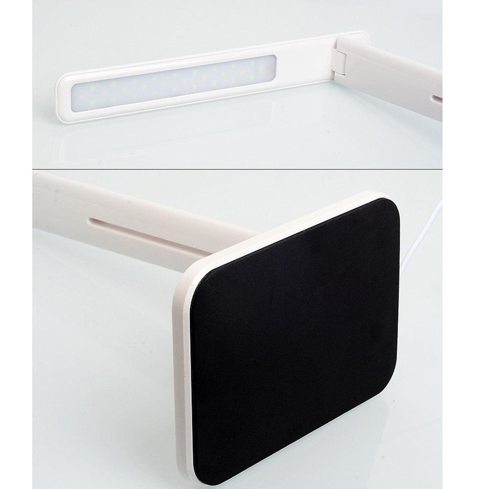 Stevvex white LED desk lamp with wireless charger, USB port, folding design on Tampa Home & Garden Store