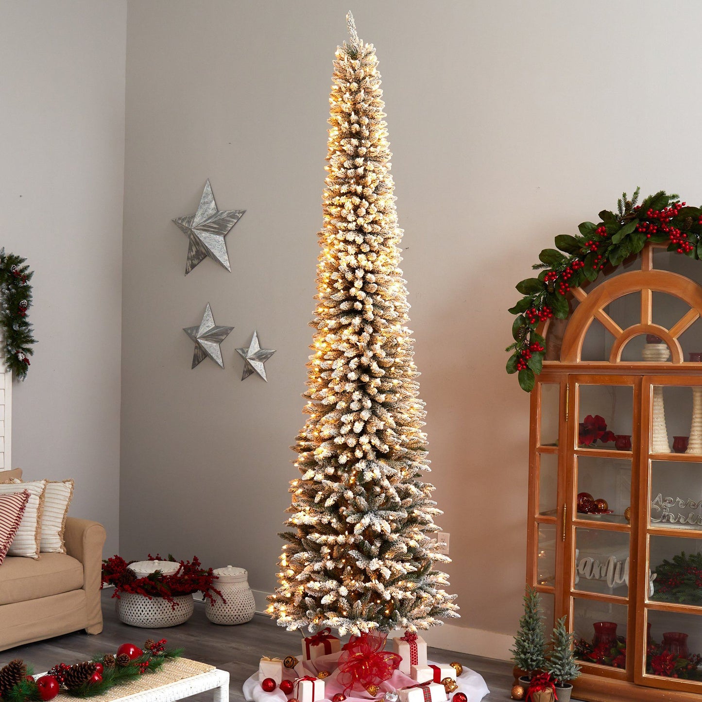 11’ Flocked Pencil Artificial Christmas Tree with 850 Clear Lights and 1435 Bendable Branches - Tampa Home & Garden Store