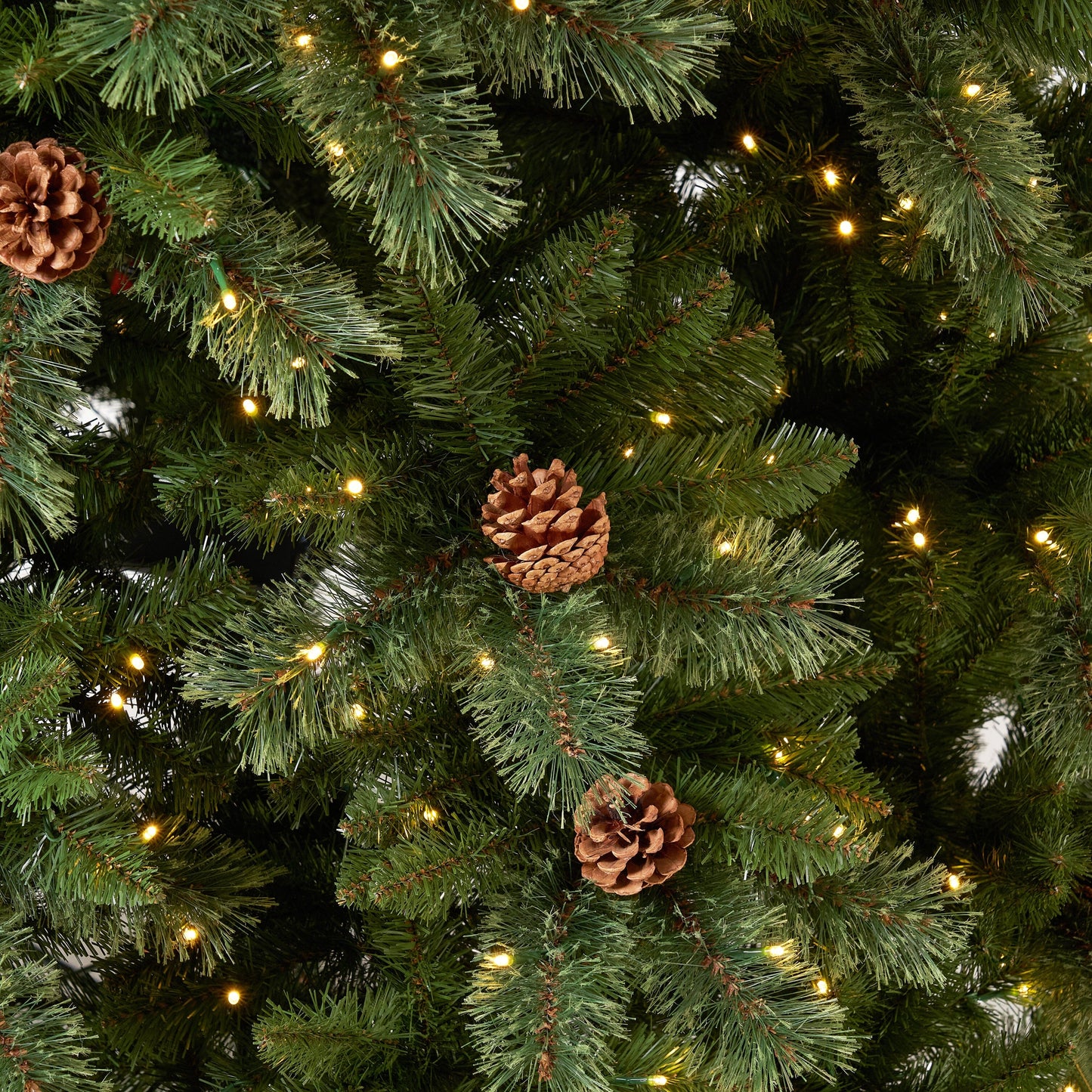 11’ White Mountain Pine Artificial Christmas Tree with 1050 Clear LED Lights, Pine Cones and 2395 Bendable Branches - Tampa Home & Garden Store