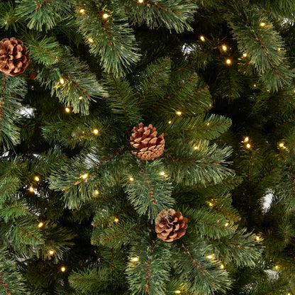 11’ White Mountain Pine Artificial Christmas Tree with 1050 Clear LED Lights, Pine Cones and 2395 Bendable Branches - Tampa Home & Garden Store