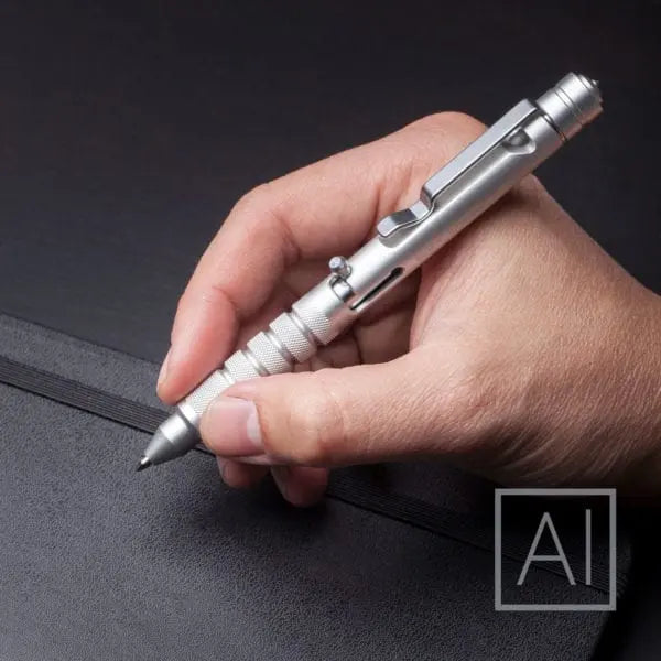 GPCA GP 1945 Bolt-Action Pen PRO titanium/aluminum EDC ballpoint held in hand on Tampa Home & Garden Store