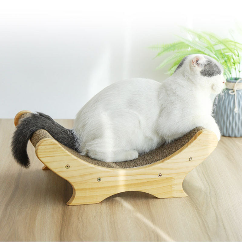 U-shaped wooden cat scratcher bed with carpet top white cat perched on it Sell My Stuff on Tampa Home & Garden Store