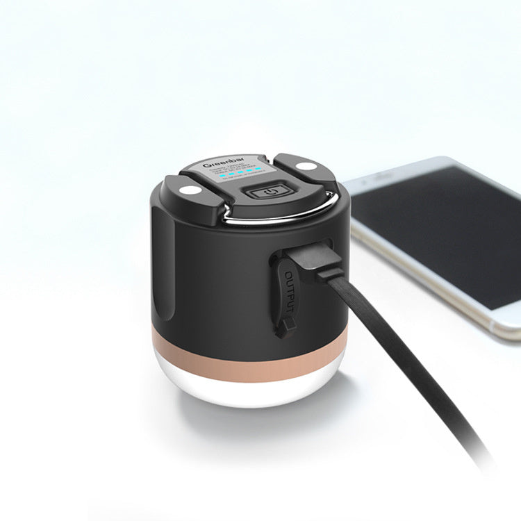 Handheld camping torch for tents; black cylindrical light with rose-gold band and strap on Tampa Home & Garden Store