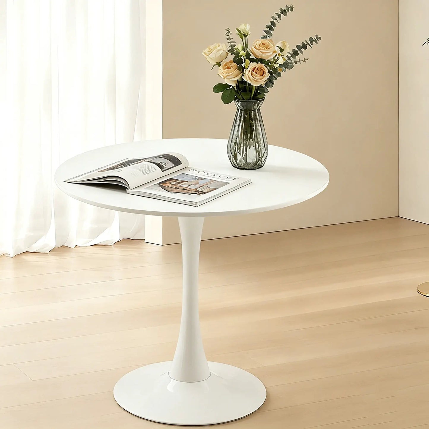 Round dining table with tulip-style pedestal base in white by Unique Piece Furniture on Tampa Home & Garden Store