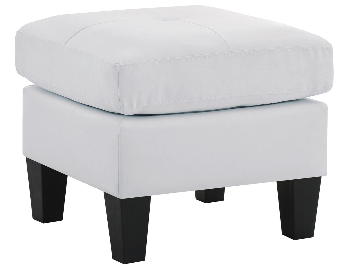 Upholstered ottoman in light gray fabric with dark tapered legs on Tampa Home & Garden Store