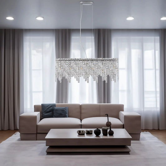 Silver oval crystal pendant light with hanging prisms in modern living room on Tampa Home & Garden Store