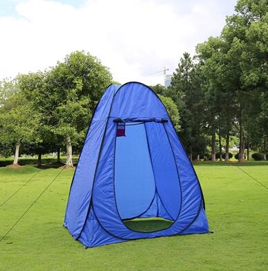 Blue portable privacy shower tent for camping with open doorway on a grassy park on Tampa Home & Garden Store